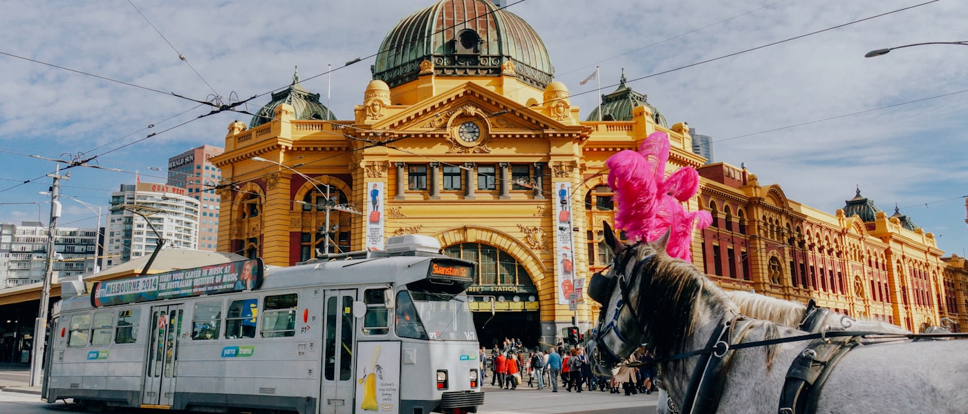 A tram passing Flinders Street Station in Melbourne